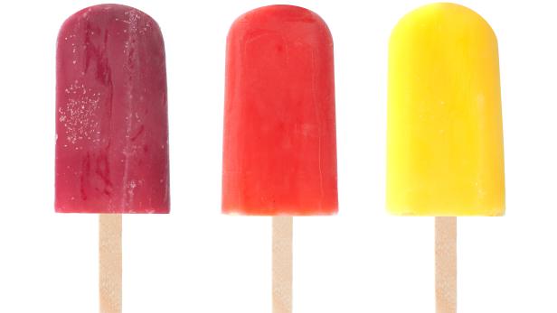 Three different flavored ice lollies over a white background Eis am Stiel bildnummer: 42072809