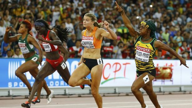 Fraser-Pryce of Jamaica celebrates as she crosses