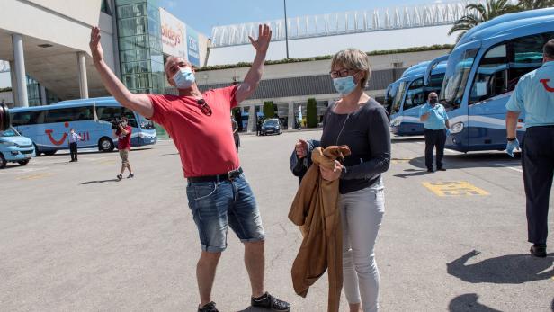 First hundreds of German tourists arrive in Spain's Mallorca as coronavirus measures eased