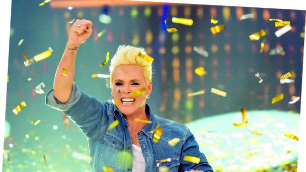 epa04877951 Danish-born actress Brigitte Nielsen reacts over her victory during the German RTL television channel show &#039;Ich bin ein Star ñ Holt mich hier raus!&#039; (I&#039;m a Star - Get Me Out of Here!) in Huerth (Nordrhein-Westfalen), Germany, 08 August 2015. EPA/HENNING KAISER