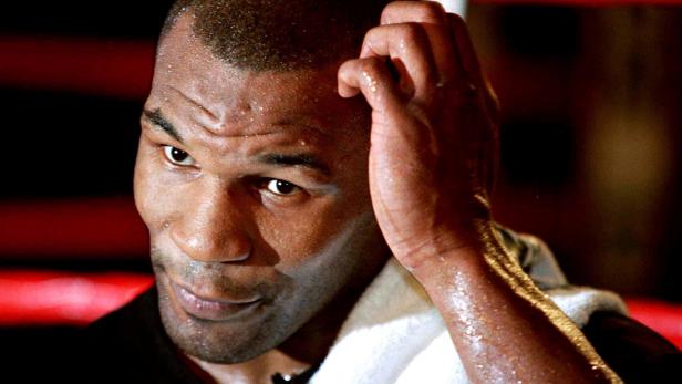 FILE PHOTO: Mike Tyson takes questions during a press conference at the MGM Grand Hotel in Las Vegas ahead of his WBA heavyweight title rematch against Evander Holyfield.