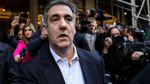 FILE PHOTO: Michael Cohen, a former lawyer for U.S. President Donald Trump leaves his apartment to report to prison in New York