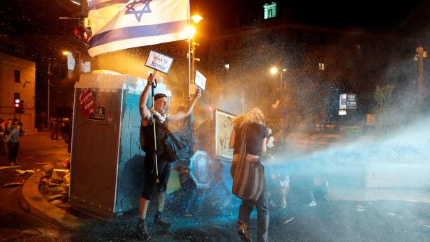 Israelis protest against Israeli PM Netanyahu's alleged corruption and handling of COVID-19 crisis in Jerusalem
