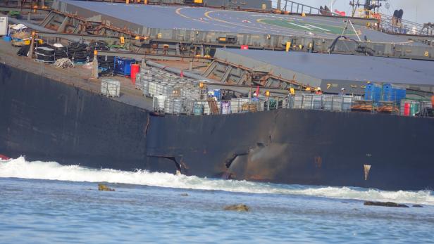 Oil from the bulk carrier ship MV Wakashio that ran aground on a reef, at Riviere des Creoles