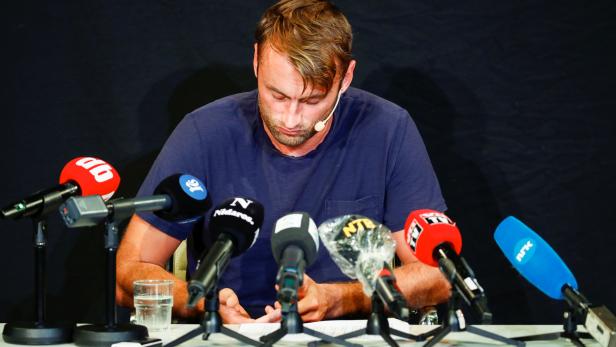 Petter Northug attends a news conference in Trondheim