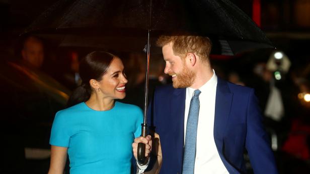 FILE PHOTO: Britain's Prince Harry and his wife Meghan, Duchess of Sussex, arrive at the Endeavour Fund Awards in London