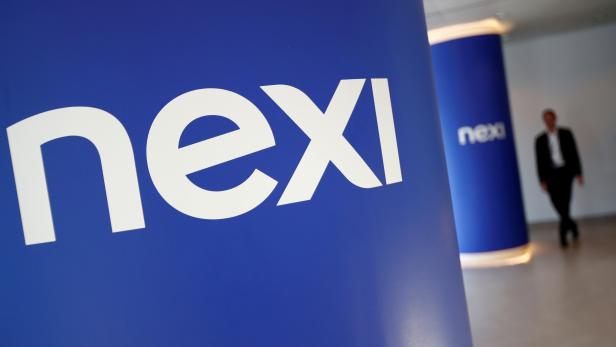 FILE PHOTO: The logo of Italian payments group Nexi is pictured inside their headquarters in Milan