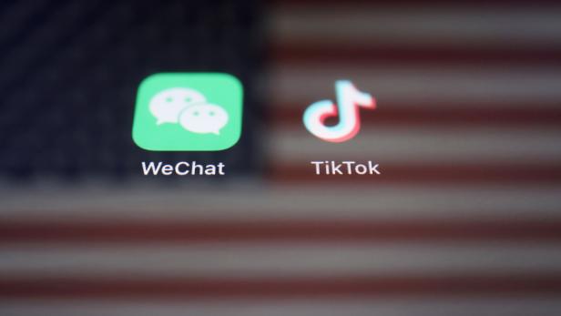 Illustration picture of U.S. flag with WeChat and TikTok