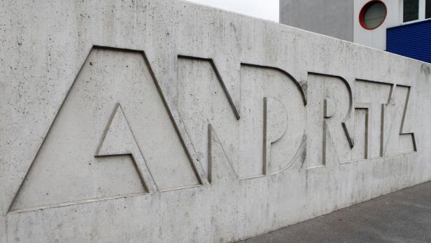 FILE PHOTO: The logo of Austrian machinery maker Andritz is pictured outside its headquarters in Vienna