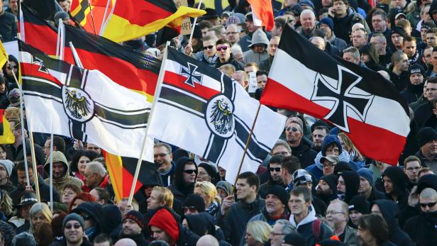 Supporters of anti-immigration right-wing movement PEGIDA protest in Cologne
