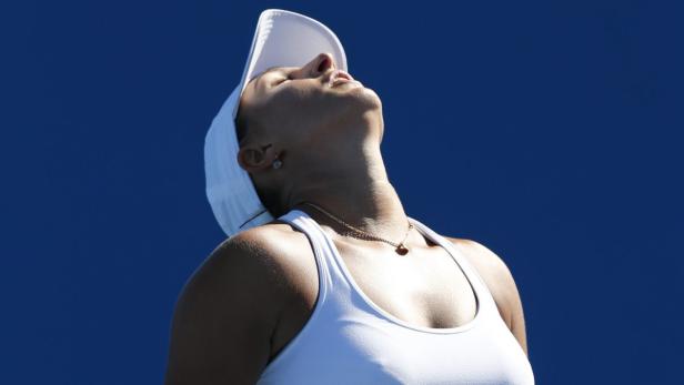 epa03535218 Tamira Paszek of Austria reacts during her 1st round match against Stefanie Voegele of Switzerland at the Australian Open Grand Slam tennis tournament in Melbourne, Australia, 14 January 2013. Paszek won in three sets. EPA/Barbara Walton