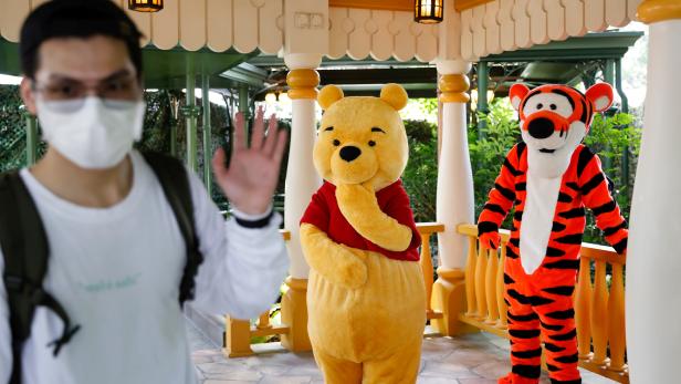 Disneyland re-opens doors to the public in Hong Kong Disneyland re-opens doors to the public in Hong Kong