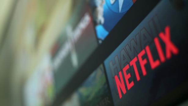 FILE PHOTO: The Netflix logo is pictured on a television in this illustration photograph taken in Encinitas California
