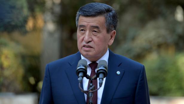 FILE PHOTO - Kyrgyzstan's President Sooronbai Jeenbekov speaks after a vote at a parliamentary elections in Bishkek