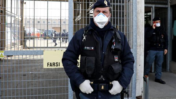 At least 6 killed in prison riot in Italy's Modena as inmates' relatives protest outside over coronavirus measures