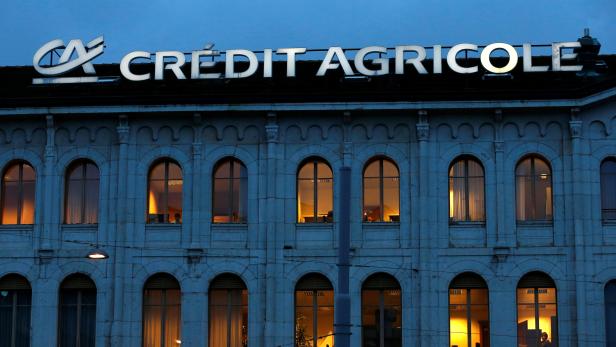FILE PHOTO: A Credit Agricole sign is pictured on a building of the bank in Geneva