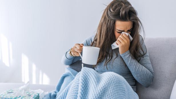 Sick woman with seasonal infections