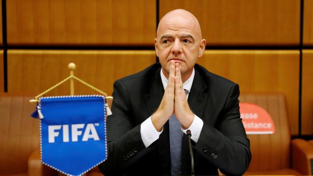 FILE PHOTO: FIFA President Infantino waits for a signing ceremony in Vienna