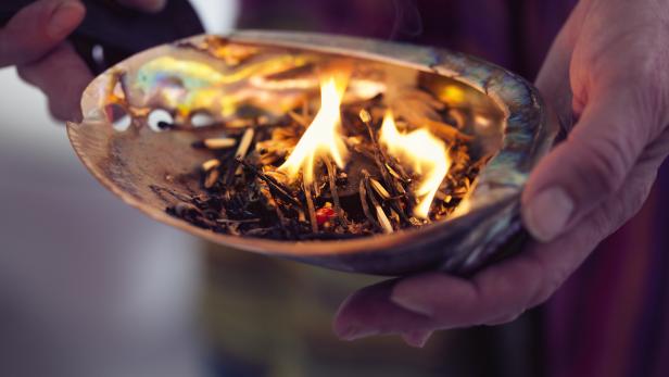 healing ceremony: burning incense in a shell