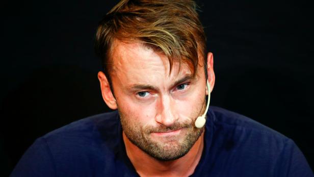 FILE PHOTO: Petter Northug attends a news conference in Trondheim
