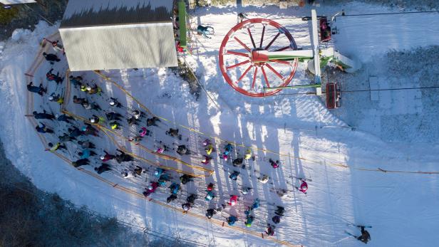 Skiers on the ski slope in Przemysl