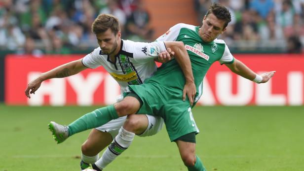 Zlatko Junuzovic (re.) und seine Bremer holten gegen den Champions-League-Starter aus Mönchengladbach den ersten Dreier.