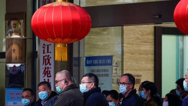 WHO experts continue coronavirus investigation in Wuhan