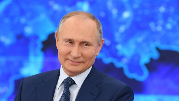 Russian President Vladimir Putin attends his annual end-of-year news conference outside Moscow