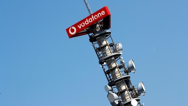 FILE PHOTO: FILE PHOTO: Different types of 4G, 5G and data radio relay antennas for mobile phone networks are pictured on a relay mast operated by Vodafone in Berlin