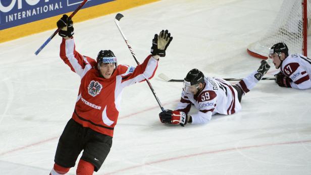 APA12639274 - 07052013 - HELSINKI - FINNLAND: IIHF EISHOCKEY-WELTMEISTERSCHAFT GRUPPE H - Michael Raffl (AUT) jubelt über das 5:3 am Dienstag, 7. Mai 2013, während der Begegnung zwischen Österreich und Lettland in der Hartwall-Arena in Helsinki. +++EDITORIAL USE ONLY+++ APA-FOTO: HELMUT FOHRINGER