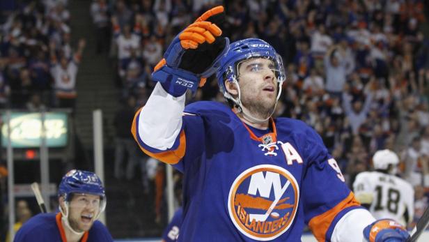 New York Islanders&#039; John Tavares celebrates his goal against the Pittsburgh Penguins&#039; with teammate Josh Bailey (12) during the third period of their Stanley Cup playoffs Eastern Conference quarter-final game in Uniondale, New York, May 7, 2013. REUTERS/Shannon Stapleton (UNITED STATES - Tags: SPORT ICE HOCKEY)