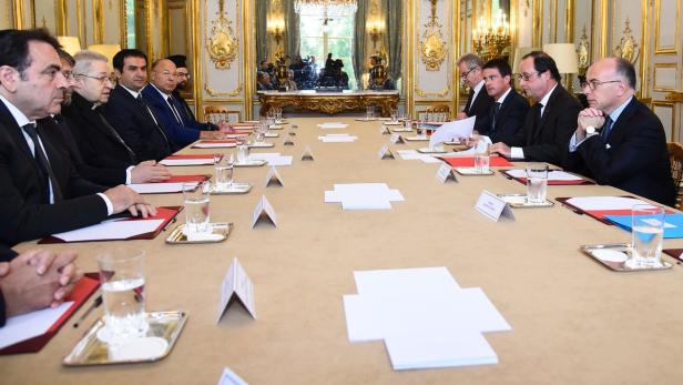 Hollande mit den Glaubensvertretern im Elyseepalast in Paris.