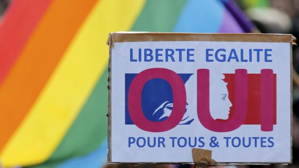 Demonstrators march through the streets of Paris i