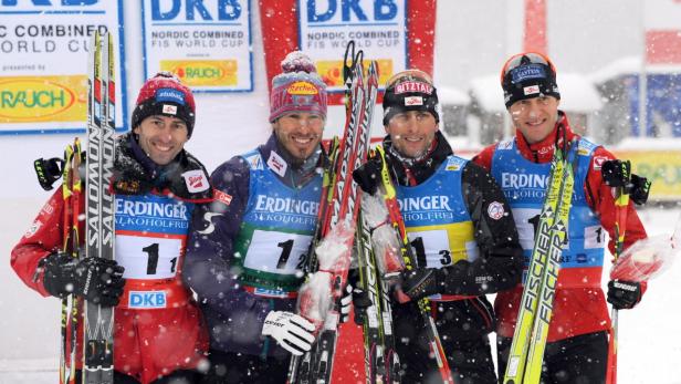 epa03052137 Austrian athletes Wilhelm Denifl (L-R), Christoph Bieler, Mario Stecher and Bernhard Gruber pose after the team competition at the nordic combination world cup in Oberstdorf, Germany, 07 January 2012. Norway came in first place, Germany in second place, Austria in third. EPA/PATRICK SEEGER