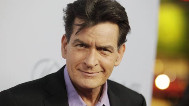 Cast member Sheen poses at the premiere of "Scary