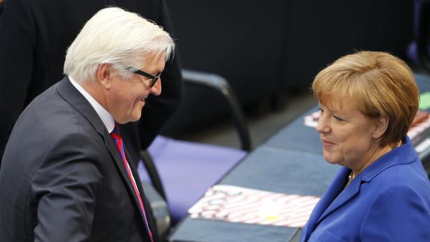 German Chancellor Merkel talks with SPD parliament