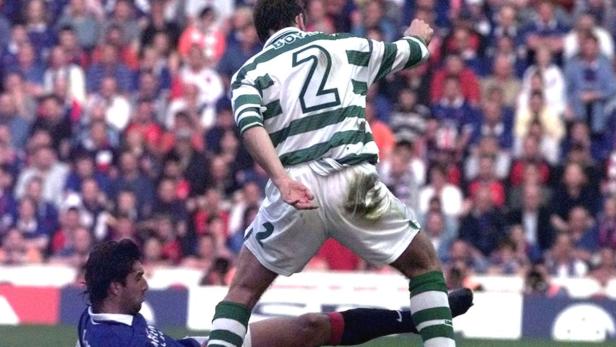 AMATO OF RANGERS TACKLES CELTIC'S BOYD
