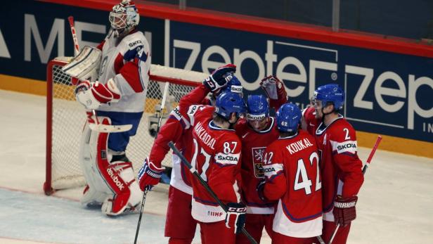 Czech Republic&#039;s players celebrate their goal in front of Norway&#039;s goalie Lars Volden during their 2013 IIHF Ice Hockey World Championship preliminary round match at the Globe Arena in Stockholm May 14, 2013. REUTERS/Arnd Wiegmann (SWEDEN - Tags: SPORT ICE HOCKEY)