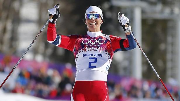 Marit Bjørgen jubelt bei den Olympischen Winterspielen 2014 in Sotschi.