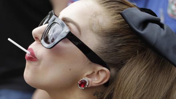 Singer Lady Gaga arrives to sign autographs for fa