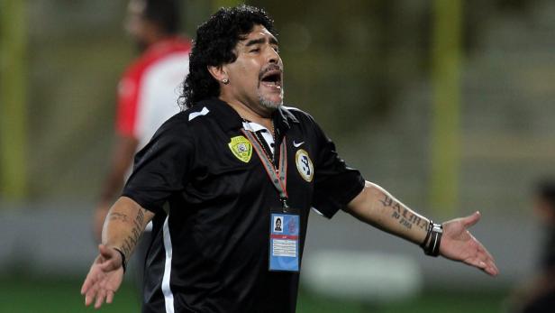 epa03258947 Al-Wasl Club&#039;s Argentinian head coach Diego Maradona reacts during the final match against Al-Muharraq Club in the Gulf Cooperation Council (GCC) Champions League at Al-Wasl Club stadium in Dubai, United Arab Emirates, 10 June 2012. Al-Muharraq won the match on penalties. EPA/ALI HAIDER