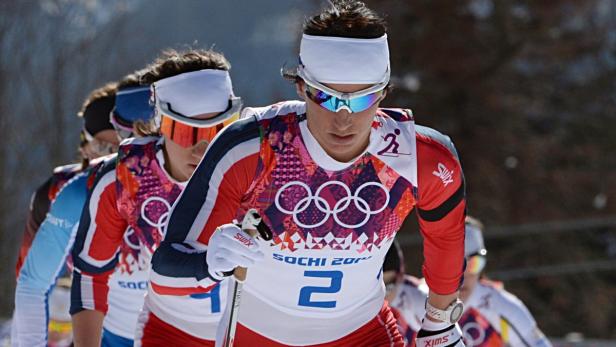 Langläufer beim Skilanglauf während der Olympischen Winterspiele in Sotschi 2014.