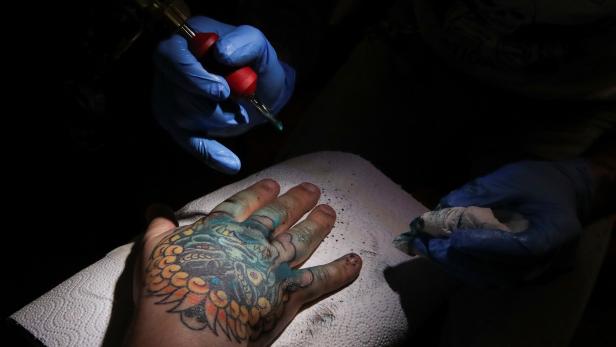 Reopening of tattoo parlors amid the coronavirus disease (COVID-19) outbreak in Brussels