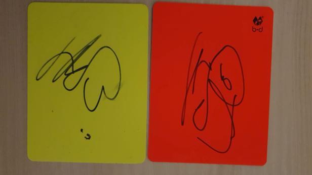 A handout image of cards signed by Borussia Dortmund striker Erling Haaland to raise money for autism charity