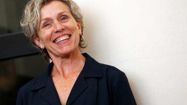 FILE PHOTO: Cast member Frances McDormand poses during a photocall for the TV mini-series "Olive Kitteridge" at the 71st Venice Film Festival