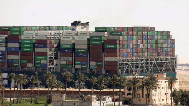 FILE PHOTO: A view shows the ship Ever Given, one of the world's largest container ships, after it was partially refloated, in Suez Canal