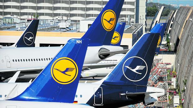 FILE PHOTO: Lufthansa planes are seen parked on the tarmac of Frankfurt Airport