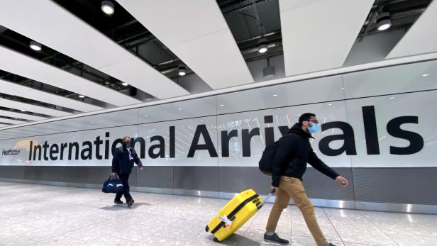 FILE PHOTO: FILE PHOTO: Travellers at Heathrow Airport