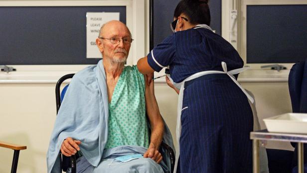 "Bill" William Shakespeare, 81, receives the Pfizer/BioNTech  COVID-19 vaccine at University Hospital in Coventry