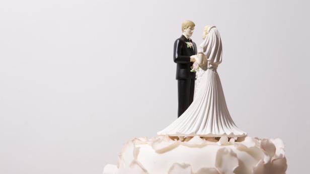 Wedding cake and bride and groom cake topper